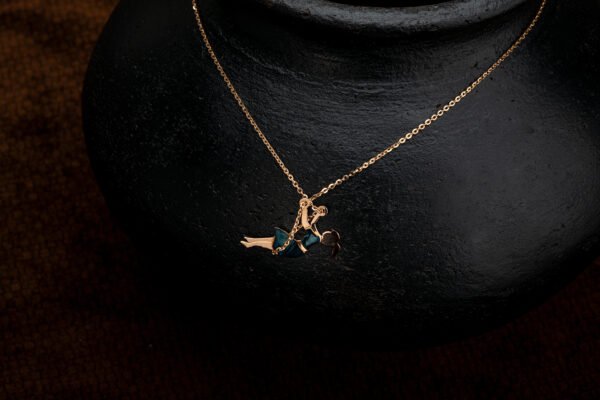 gold chain with girl design pendent