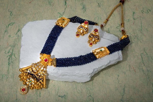 gold necklace and pendant