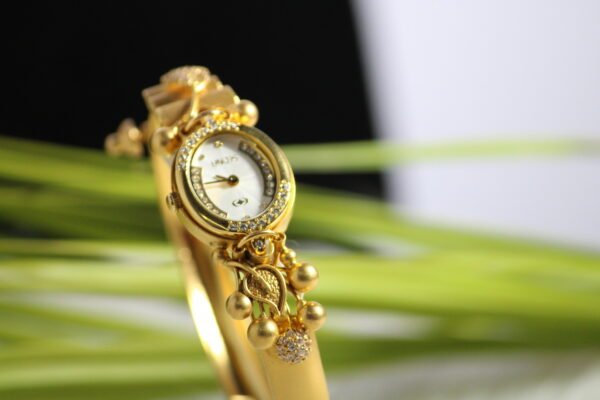 kada style golden ladies watch