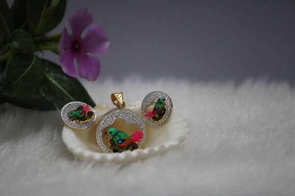pendent set with bird design