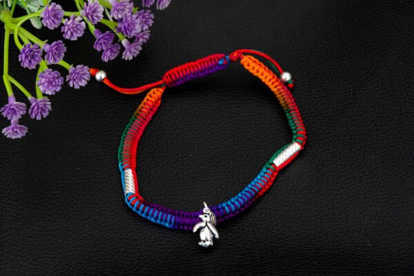 silver and gold anklets