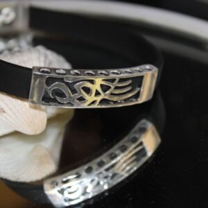 silver bracelet with black belt