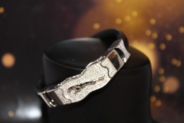 silver bracelet with jaguar design