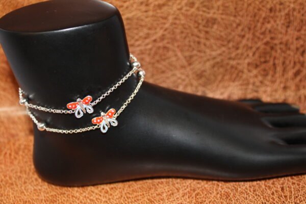 silver payal with butterfly design