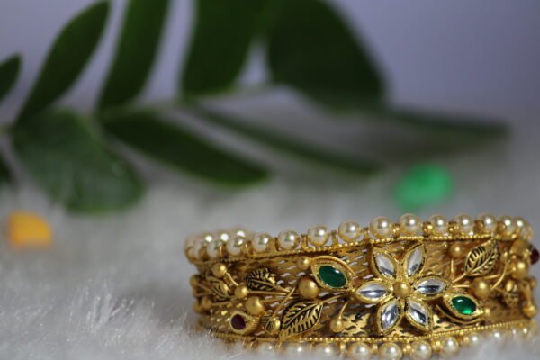 the gold bracelet